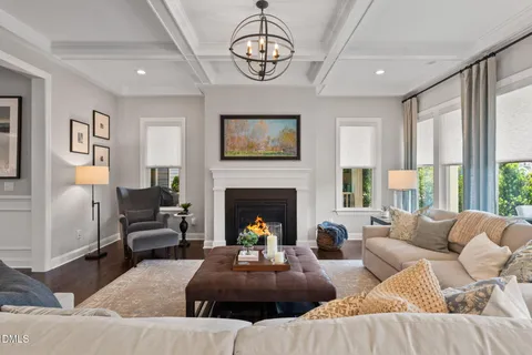 a large kitchen with stainless steel appliances granite countertop a lot of counter space and wooden floors