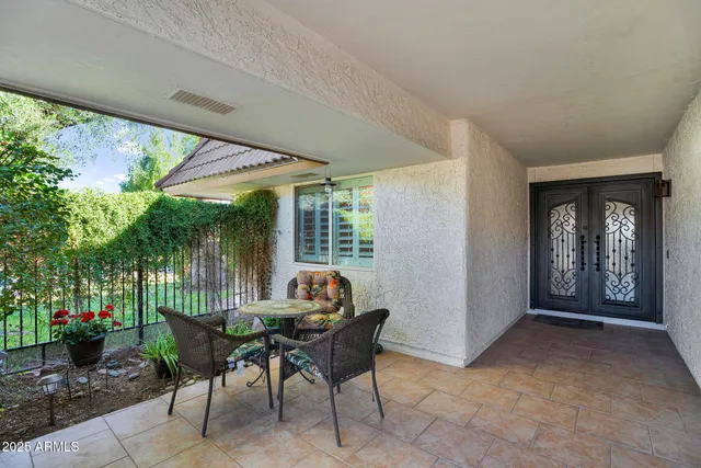 a outdoor living space with furniture and garden view