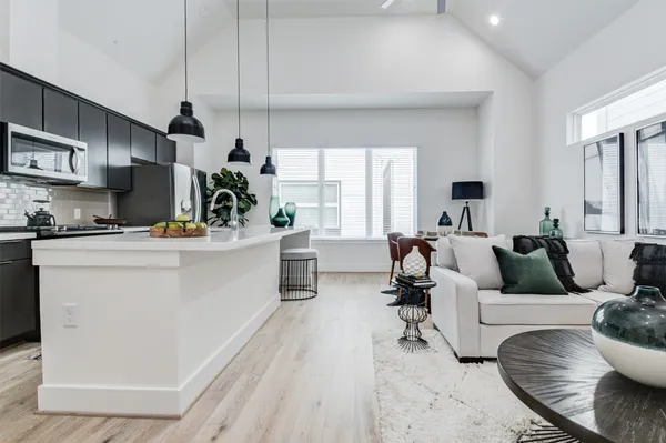 a living room with furniture and a couch