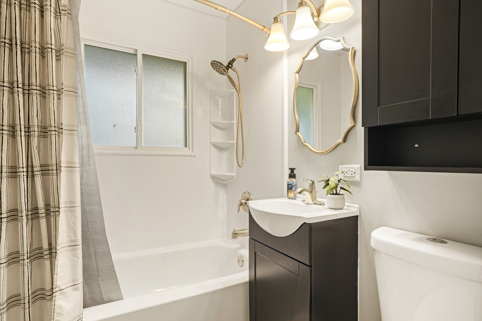 3408 Sally Drive Steger, IL 60475 - Photo 11 of 15 a bathroom with a sink and a mirror