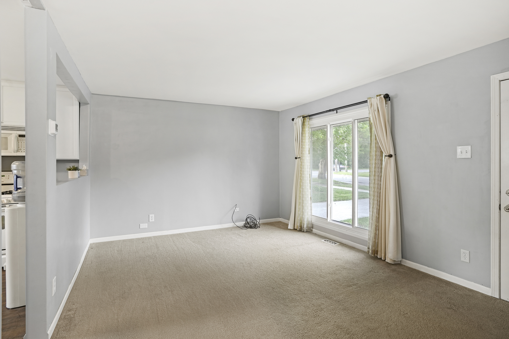 3408 Sally Drive Steger, IL 60475 - Photo 5 of 15 a view of an empty room with glass door