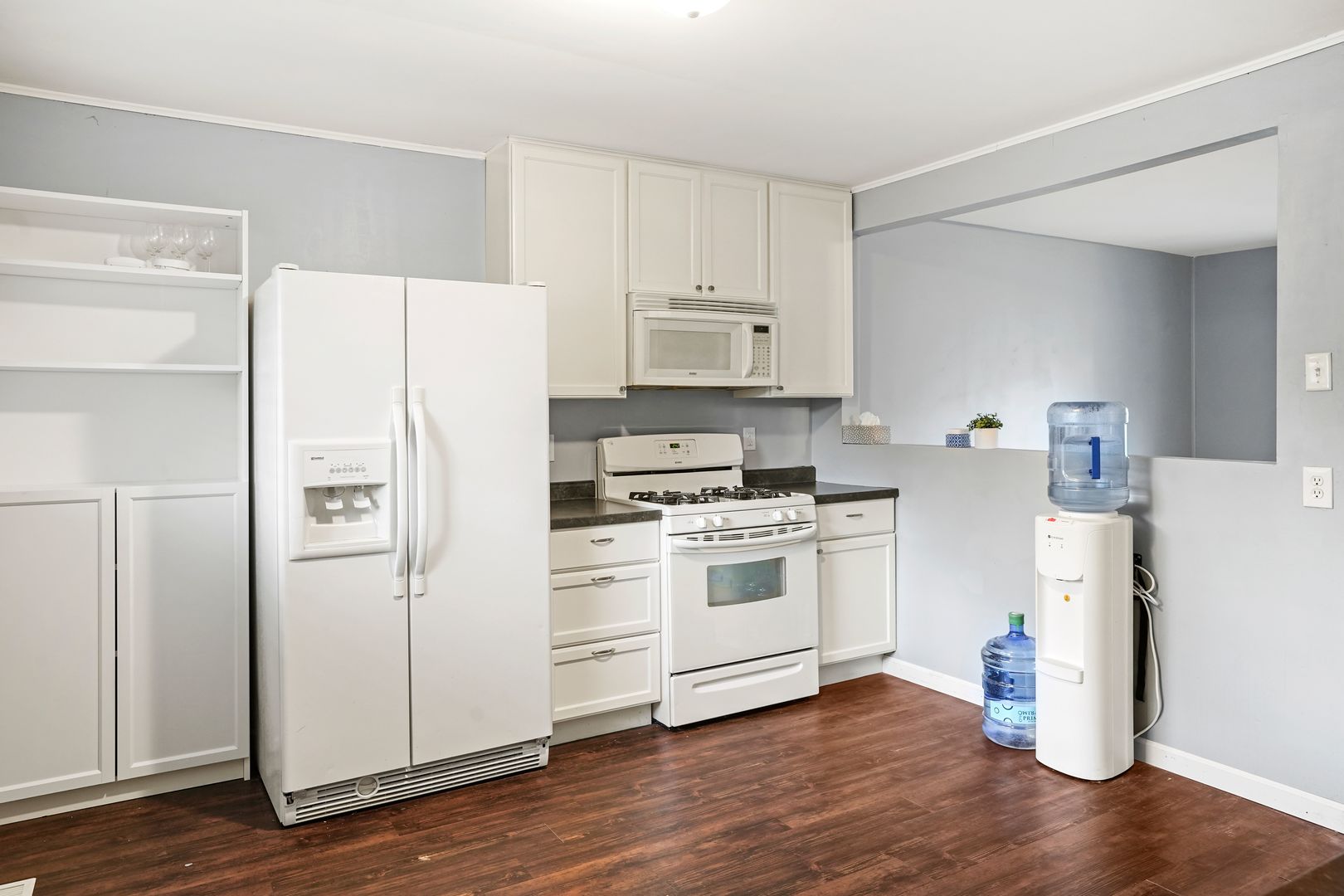 3408 Sally Drive Steger, IL 60475 - Photo 8 of 15 a kitchen with a refrigerator stove and wooden floor
