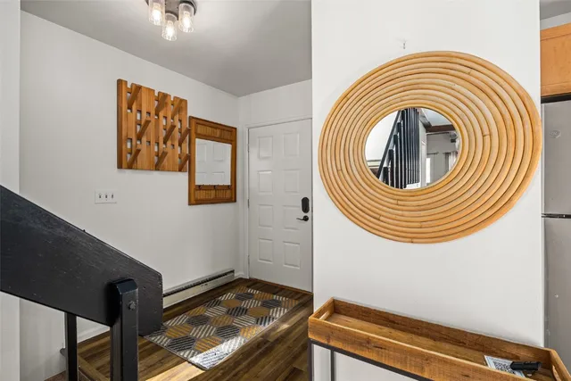 a view of a bedroom with washer and dryer