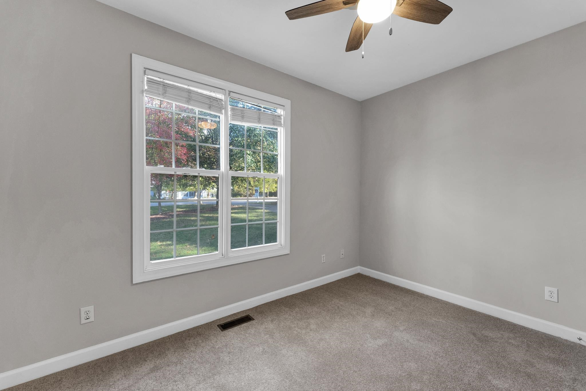 6914 Wexford Woods Trail Raleigh, NC 27613 - Photo 21 of 37 an empty room with a window