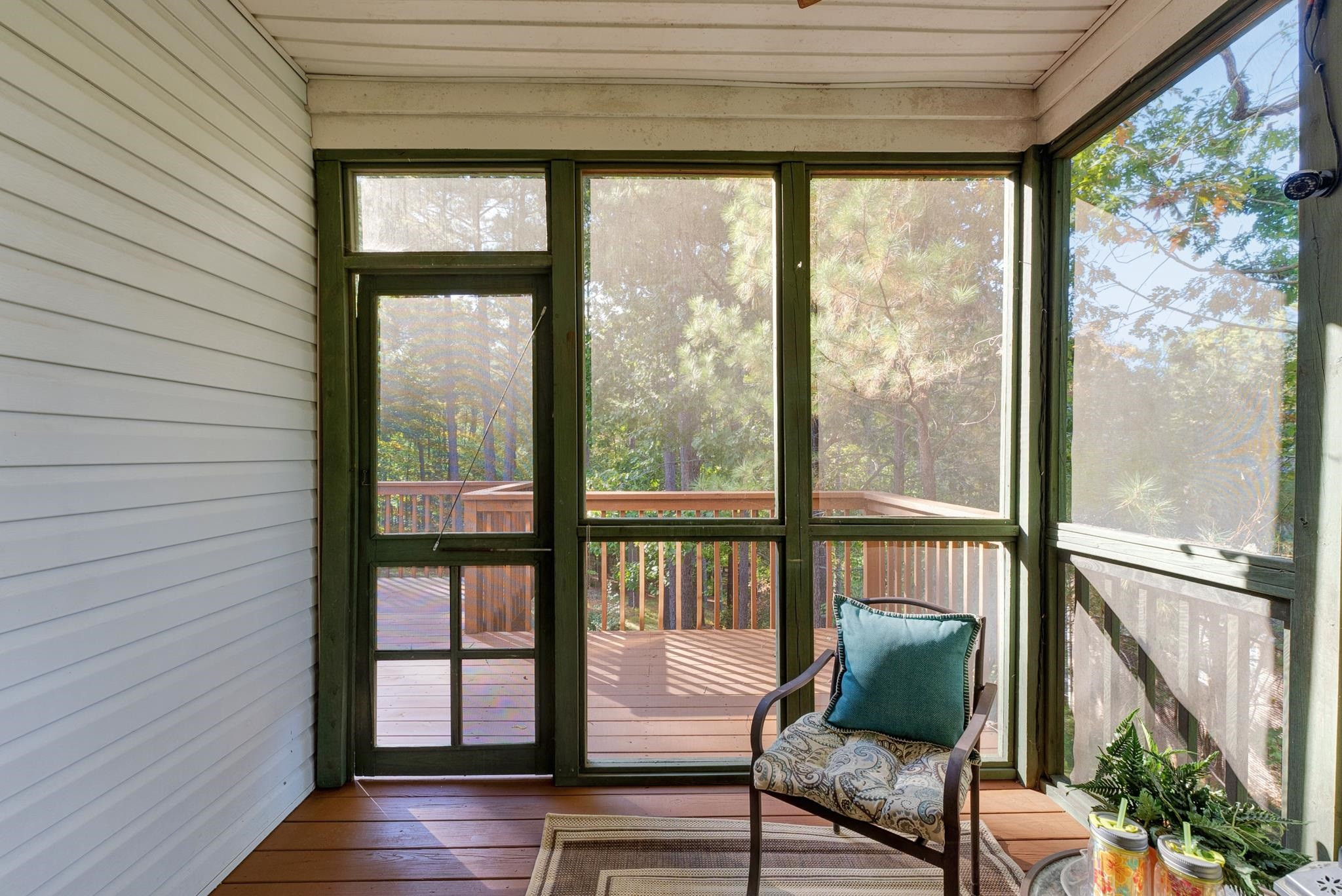 6914 Wexford Woods Trail Raleigh, NC 27613 - Photo 31 of 37 a view of a room with wooden floor and windows