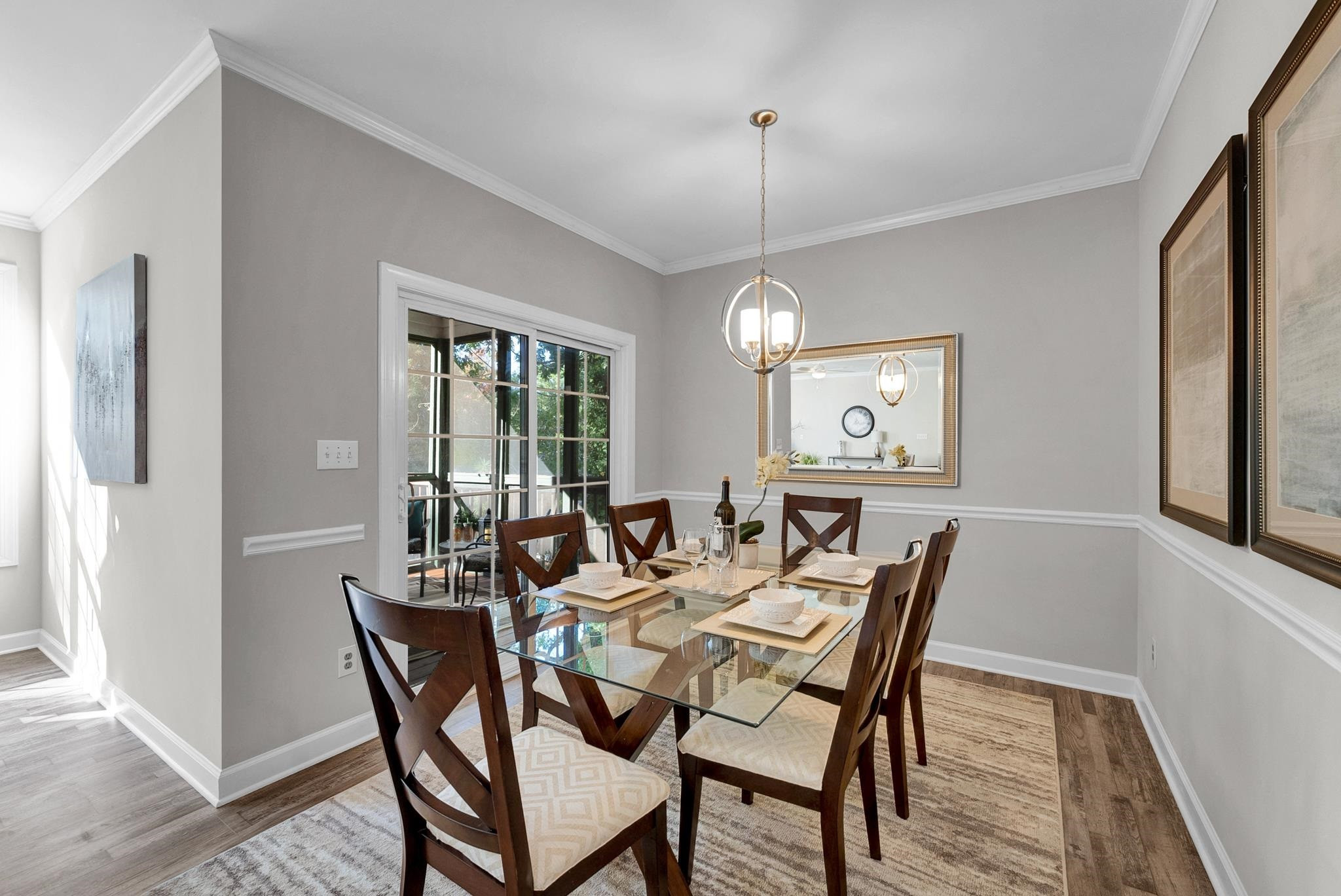 6914 Wexford Woods Trail Raleigh, NC 27613 - Photo 7 of 37 a view of a dining room with furniture window and wooden floor