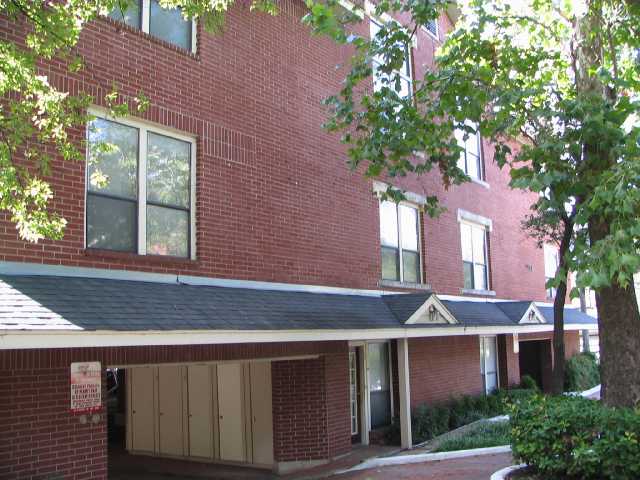 2804 Rio Grande Street, Unit 309 Austin, TX 78705 - Photo 1 of 1 a front view of a house with garden