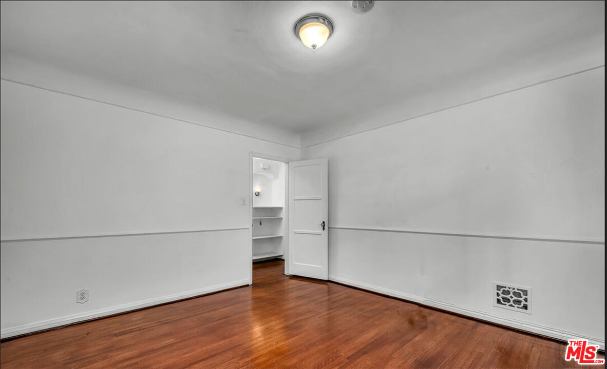 6369 Orange Street Los Angeles, CA 90048 - Photo 12 of 23 wooden floor in an empty room