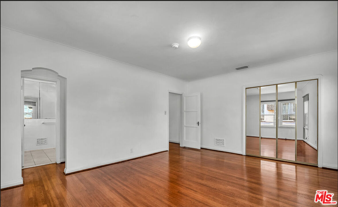 6369 Orange Street Los Angeles, CA 90048 - Photo 18 of 23 wooden floor in an empty room
