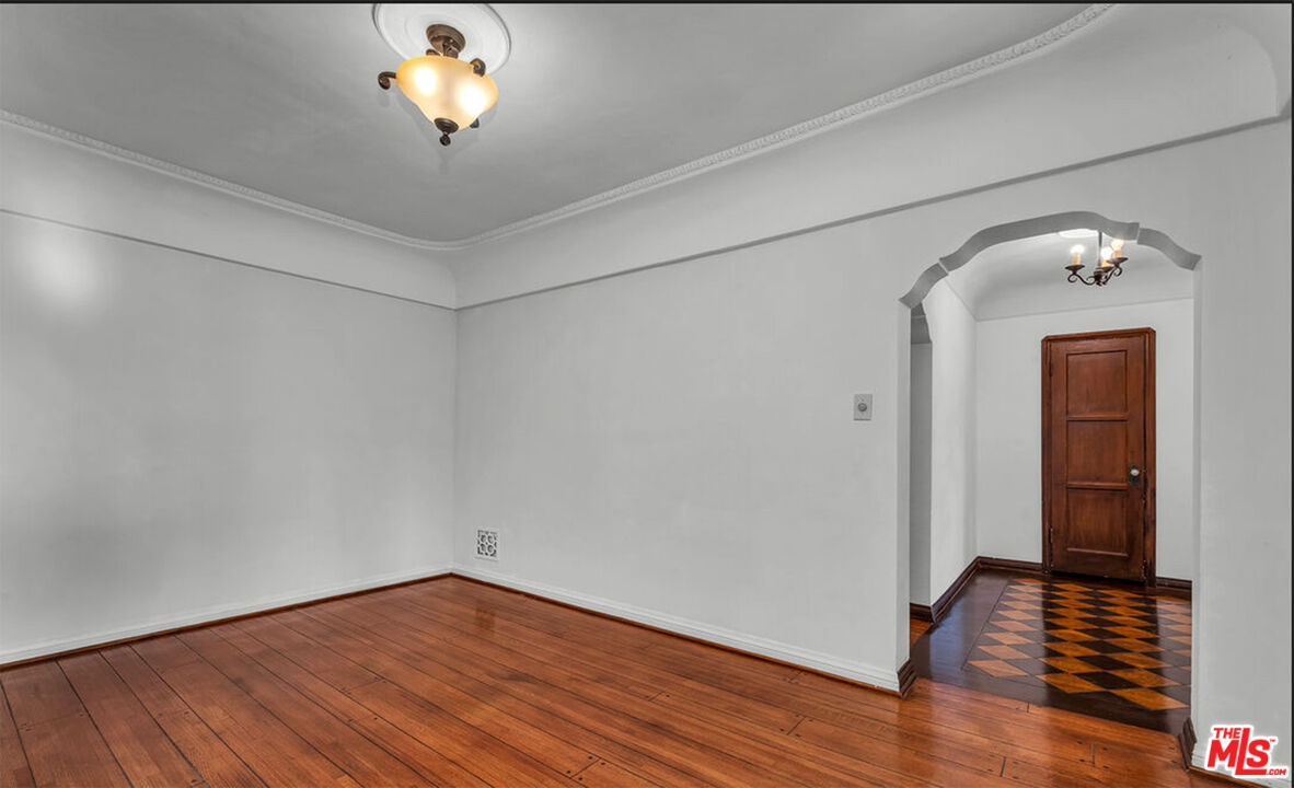 6369 Orange Street Los Angeles, CA 90048 - Photo 5 of 23 a view of empty room with wooden floor