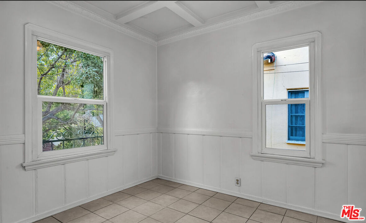 6369 Orange Street Los Angeles, CA 90048 - Photo 7 of 23 an empty room with windows