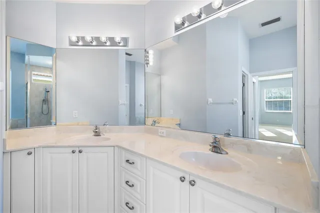 a view of a kitchen with wooden floor