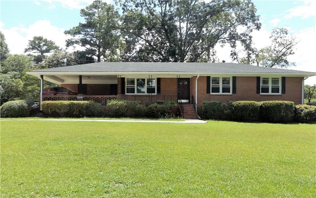 1691 Rockbridge Road Southwest Stone Mountain, GA 30087 - Photo 1 of 1 Contemporary Southern Charm! This fully renovated home is move in ready! Has wonderful fenced back yard, and screened in porch!