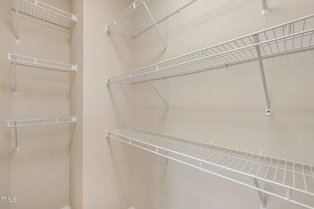 a view of a room with racks on the wall