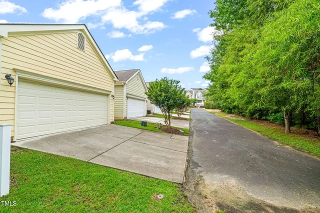 a view of a backyard with green space