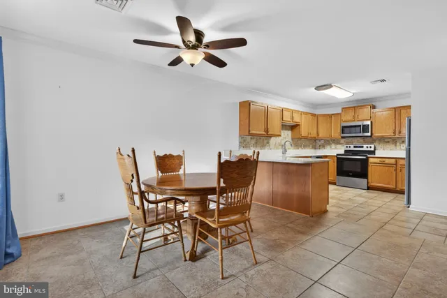 a view of a dining room kitchen and a window
