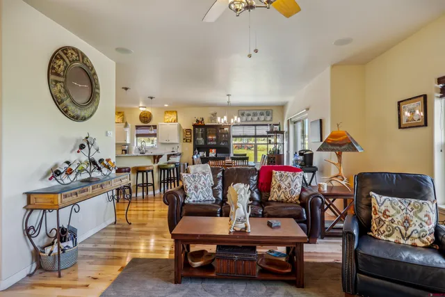 a view of a house with backyard and garden