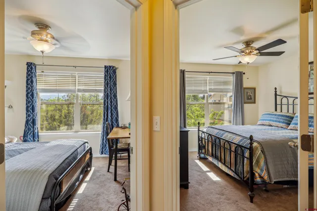 a bedroom with furniture and a window