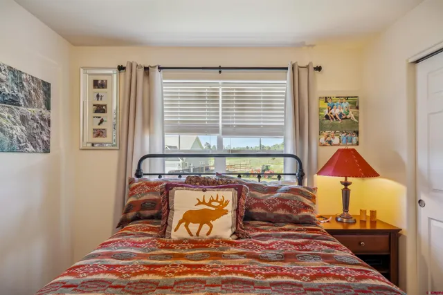 a view of a patio in the backyard