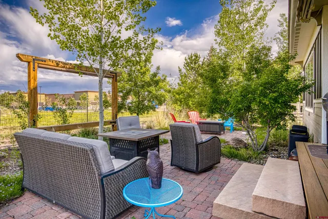 a view of a building with outdoor seating