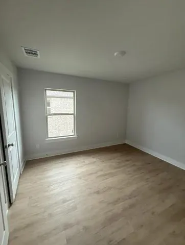 an empty room with a window