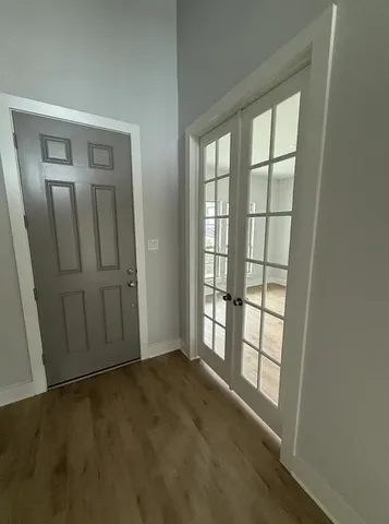 an empty room with windows