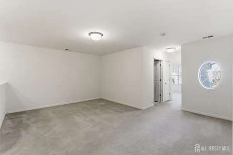 a living room with furniture a wall paintings and a wall painting
