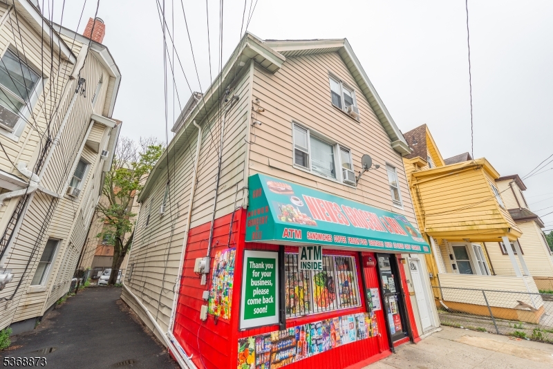 a front view of building with large windows