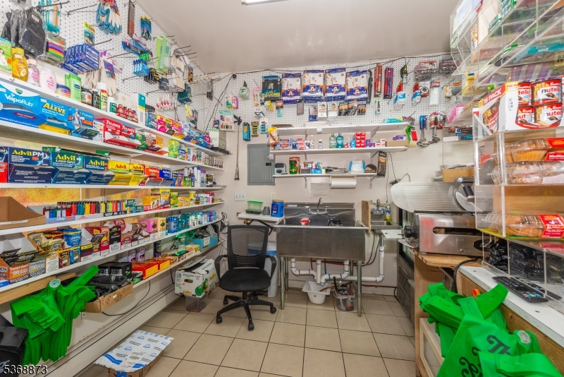 609 Madison Avenue, Unit 2 Paterson, NJ 07514 - Photo 12 of 43 a room with lots of different kinds of flowers