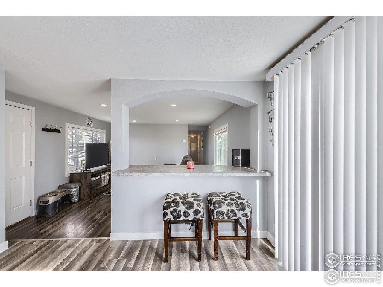 3500 35th Avenue, Unit 3 Greeley, CO 80634 - Photo 16 of 27 Barstool seating off kitchen!