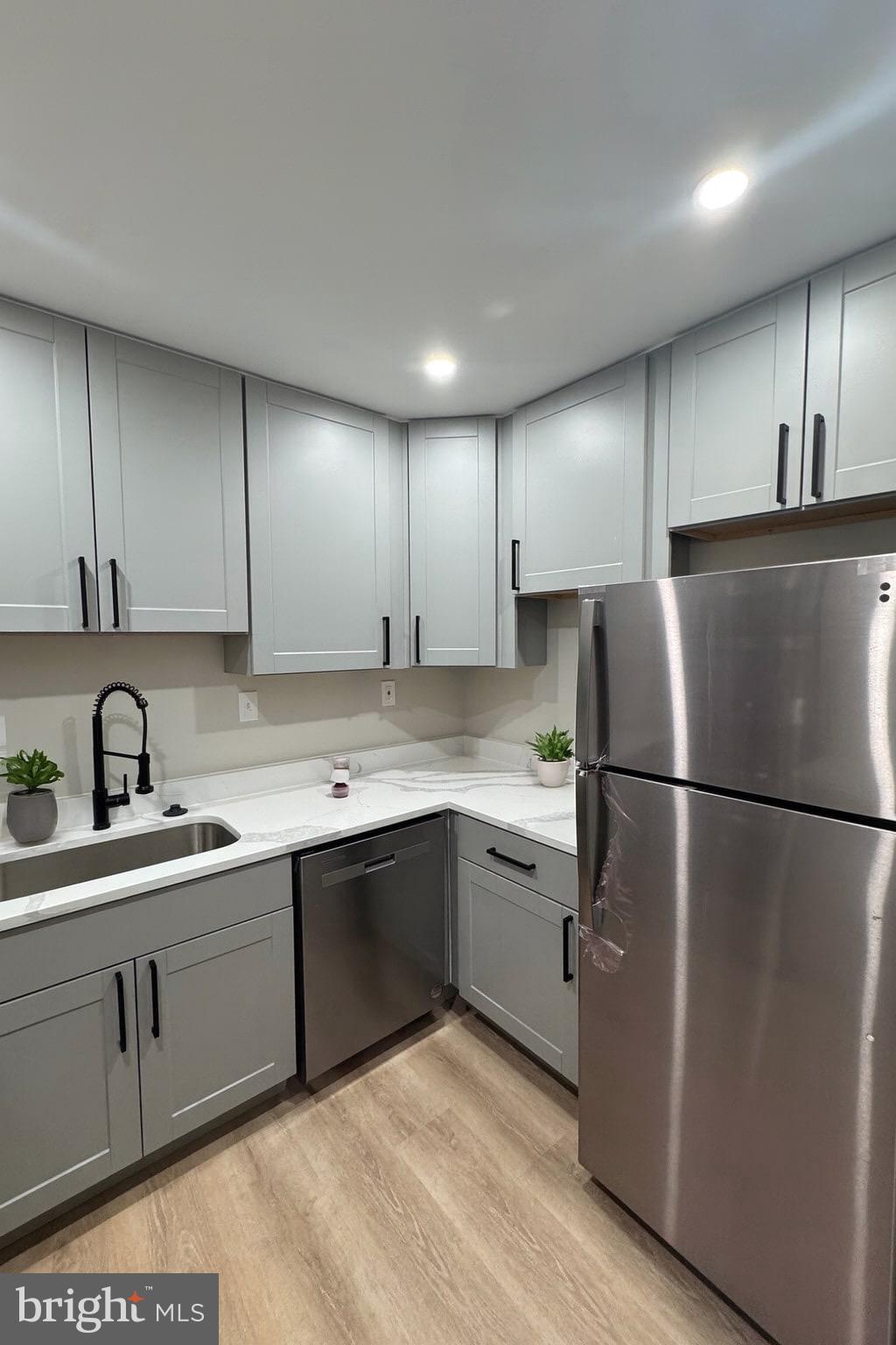 3801 Swann Road, Unit 303 Suitland, MD 20746 - Photo 7 of 19 Modern kitchen with sleek finishes.