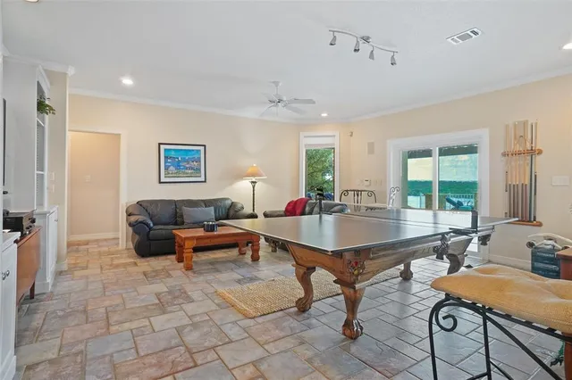a living room with furniture and a table