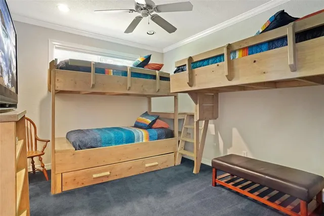 a bedroom with bunk bed