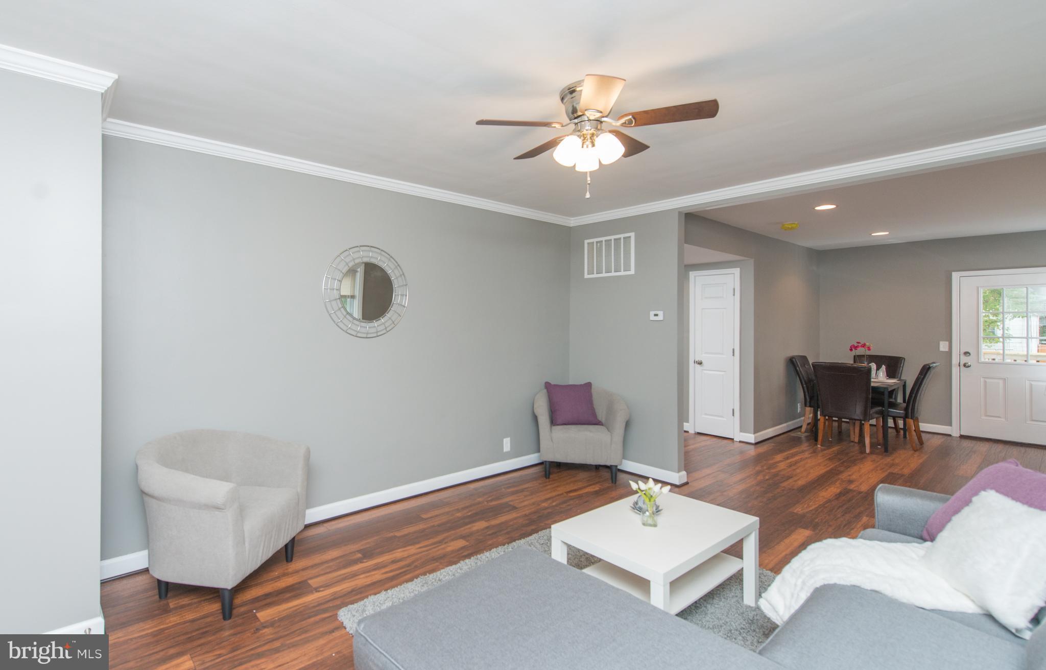 2633 Wycliffe Road Baltimore, MD 21234 - Photo 3 of 28 Living Room with Ceiling Fan and wood floors