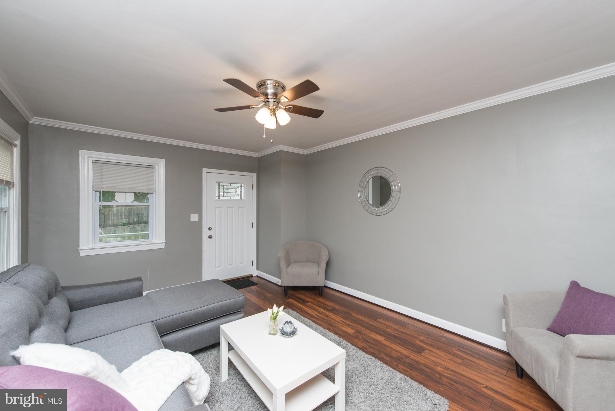 2633 Wycliffe Road Baltimore, MD 21234 - Photo 4 of 28 Living Room w/ Crown Molding