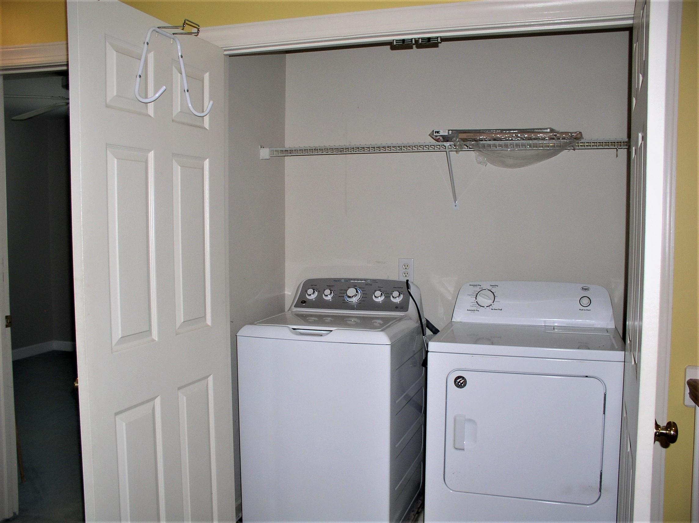3516 Kapalua Way Raleigh, NC 27610 - Photo 35 of 42 a utility room with dryer and washer