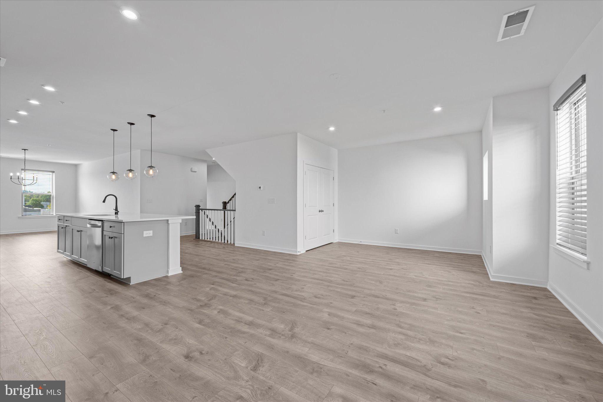46207 Woodpecker Square Sterling, VA 20165 - Photo 12 of 37 a view of a kitchen with furniture and a window