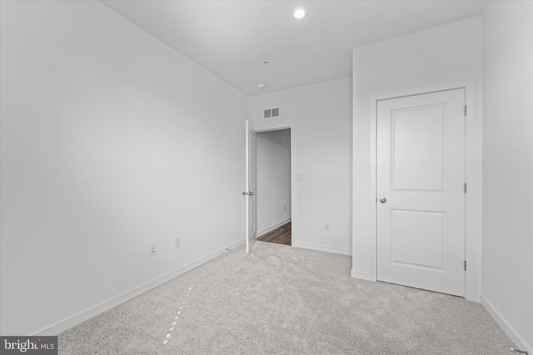 46207 Woodpecker Square Sterling, VA 20165 - Photo 23 of 37 a view of an empty room