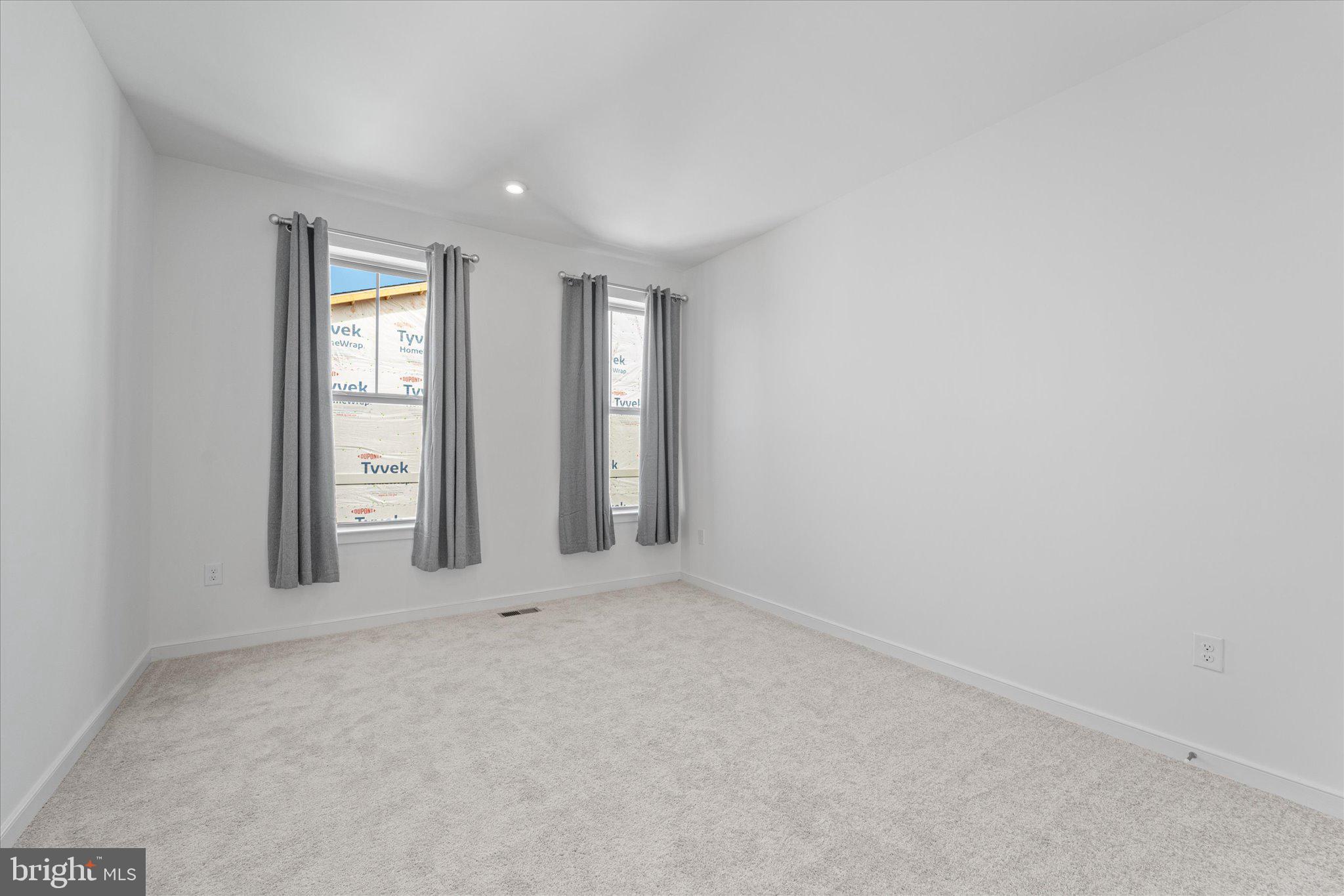 46207 Woodpecker Square Sterling, VA 20165 - Photo 26 of 37 an empty room with windows