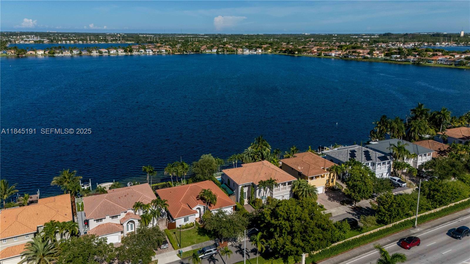 13731 Southwest 136th Place Miami, FL 33186 - Photo 78 of 94 an aerial view of a house with a lake view