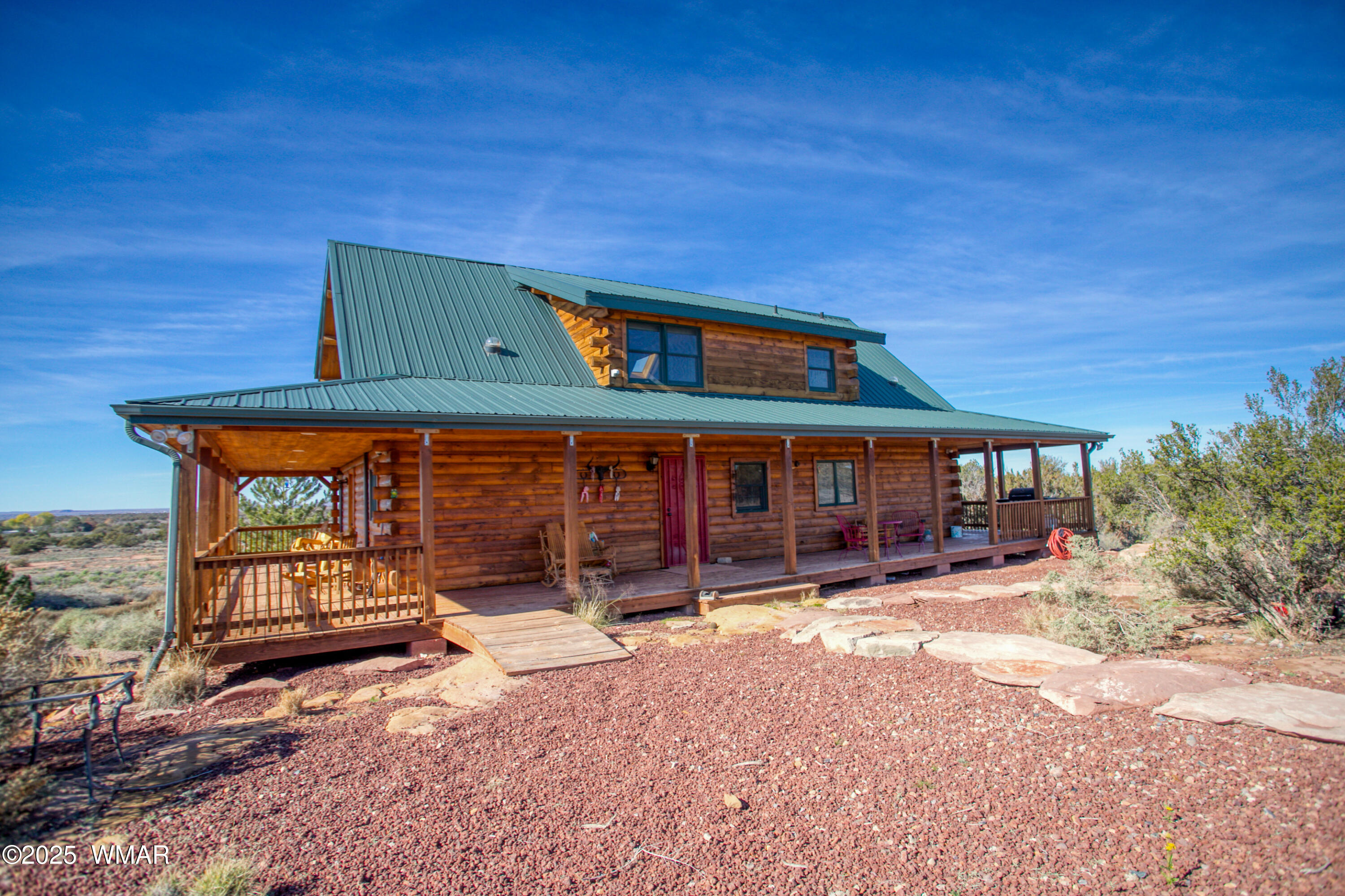 8555 Reata Lane Snowflake, AZ 85937 - Photo 80 of 88 a view of a house with a yard and wooden fence