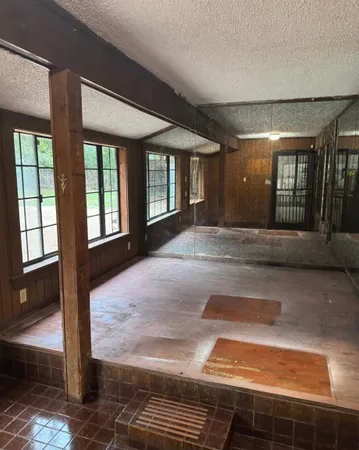 a view of an empty room and window