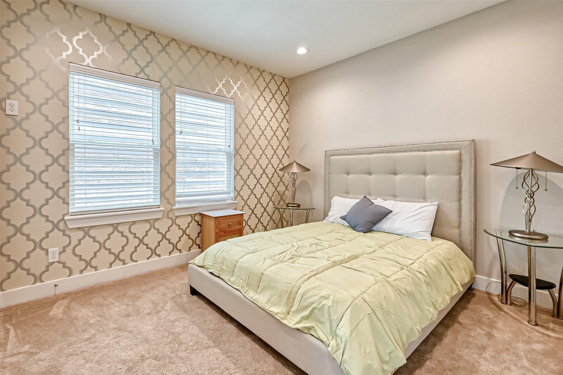 882 Fortune Street Houston, TX 77088 - Photo 13 of 18 a bedroom with a bed and a couch