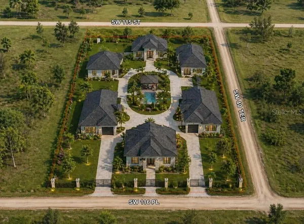 an aerial view of a house with a swimming pool