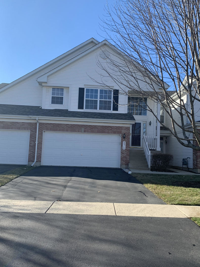 a front view of house with yard