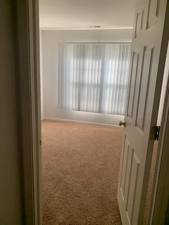 a view of room with front door