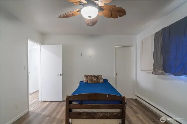 a view of entryway with wooden floor
