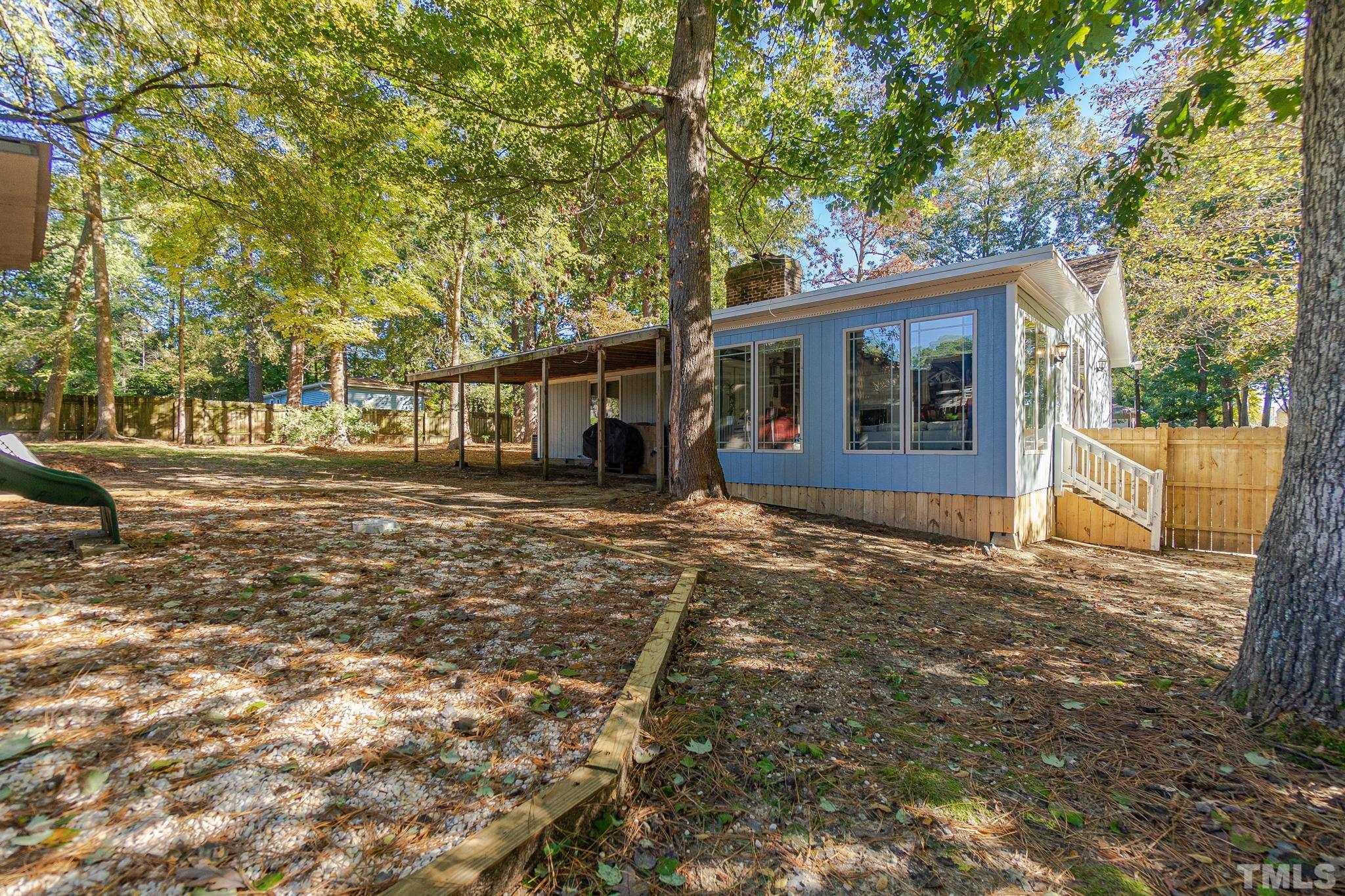 2207 Dorety Place Raleigh, NC 27604 - Photo 23 of 27 front view of a house with a yard