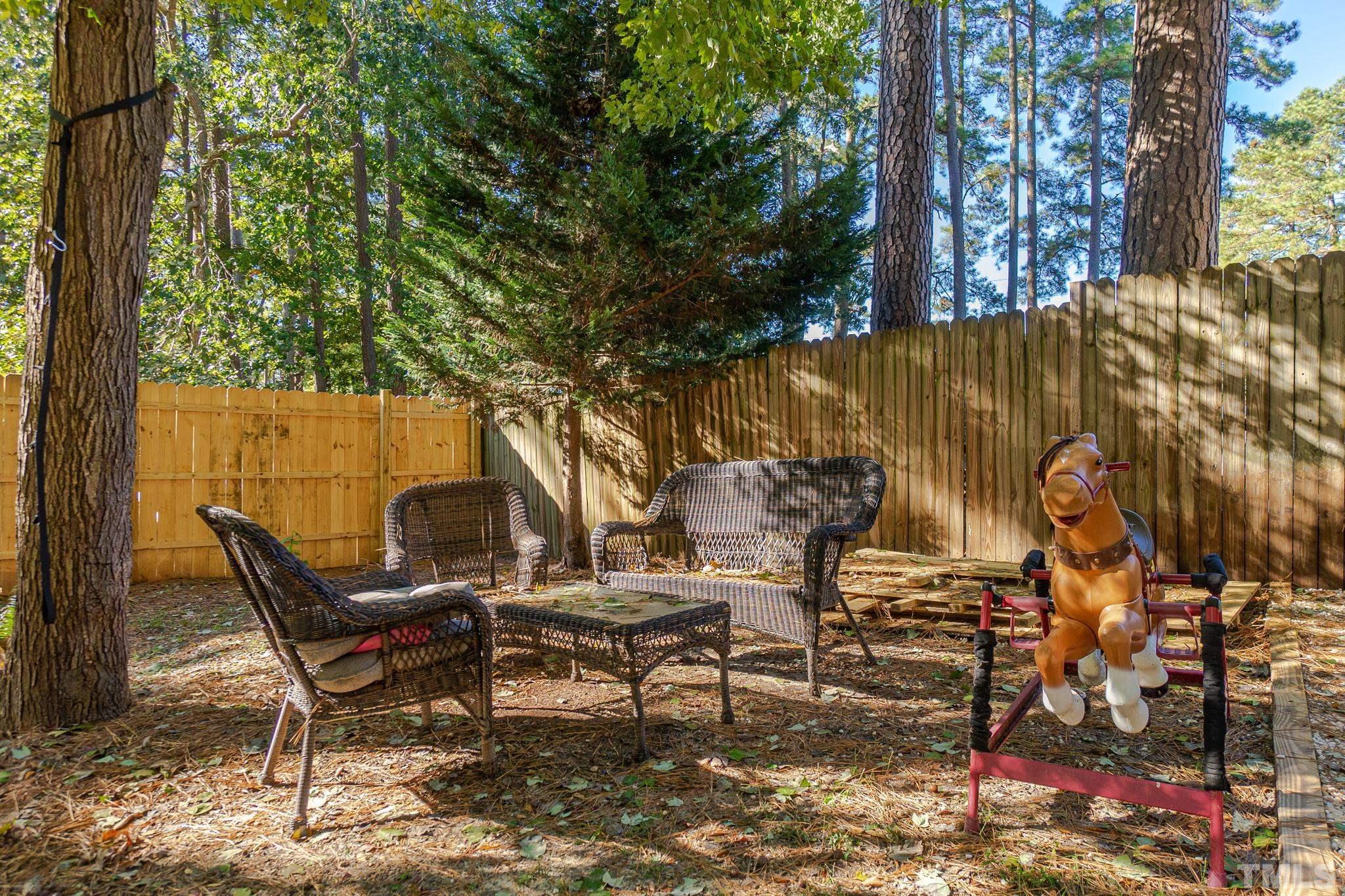 2207 Dorety Place Raleigh, NC 27604 - Photo 24 of 27 a view of a outdoor space with chairs