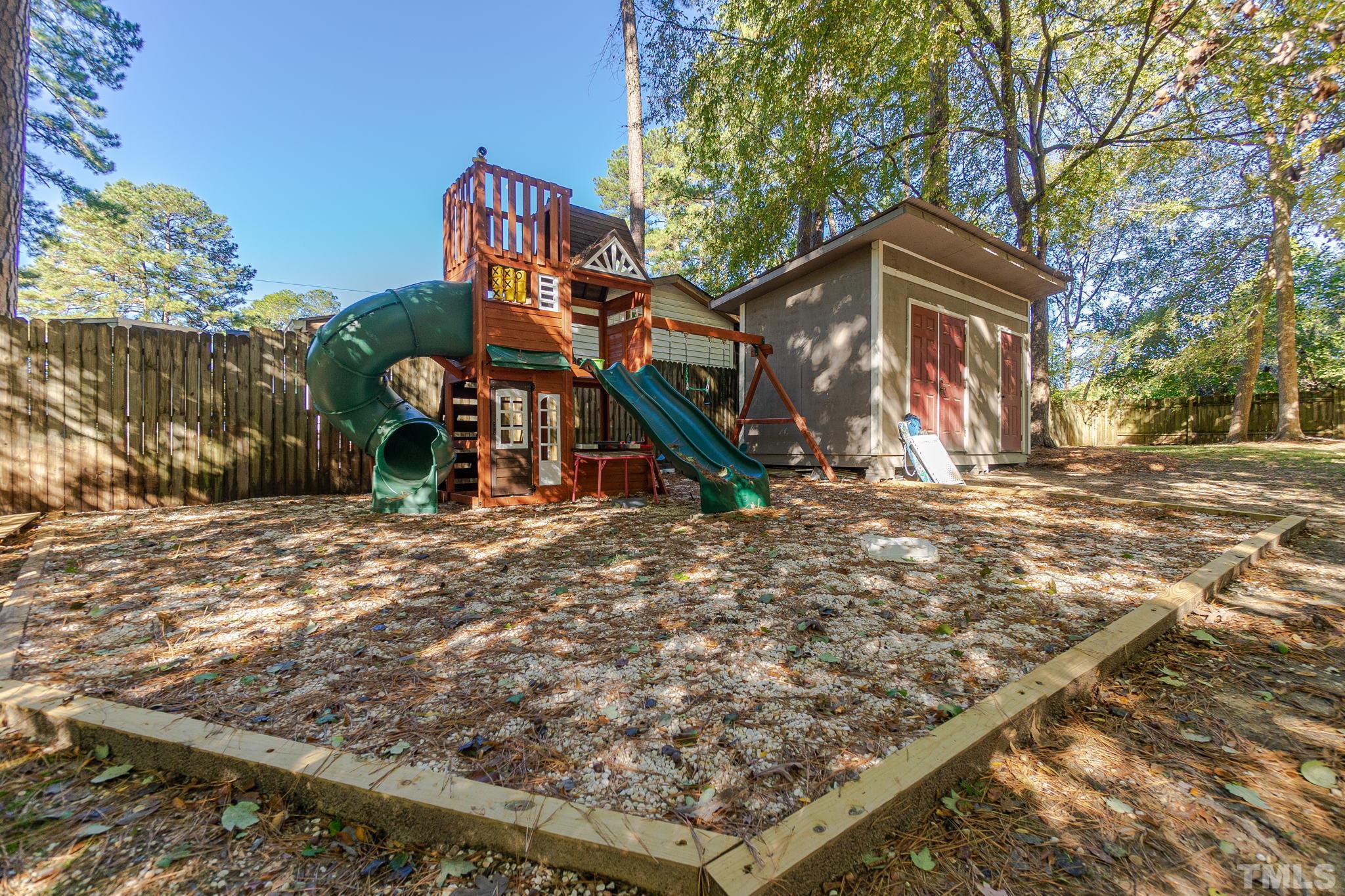 2207 Dorety Place Raleigh, NC 27604 - Photo 25 of 27 a view of outdoor space yard and slide